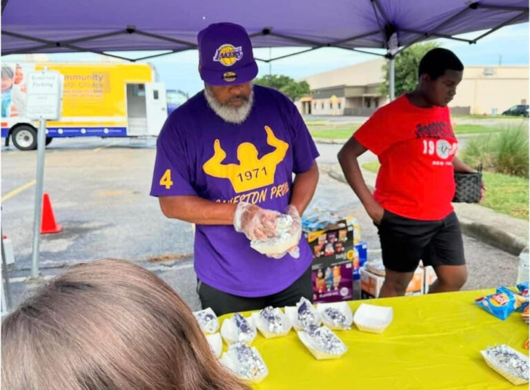 Brother Burke is serving refreshments to the community