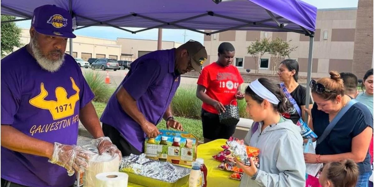 Brothers Providing Hotdogs and food